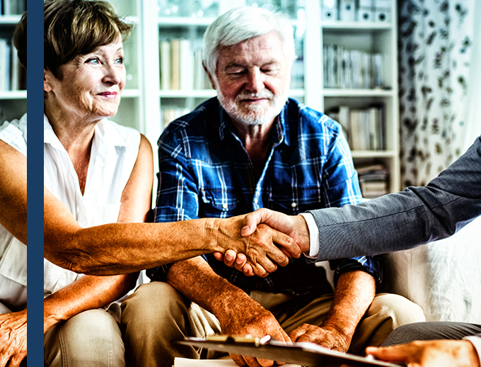 banker with senior couple