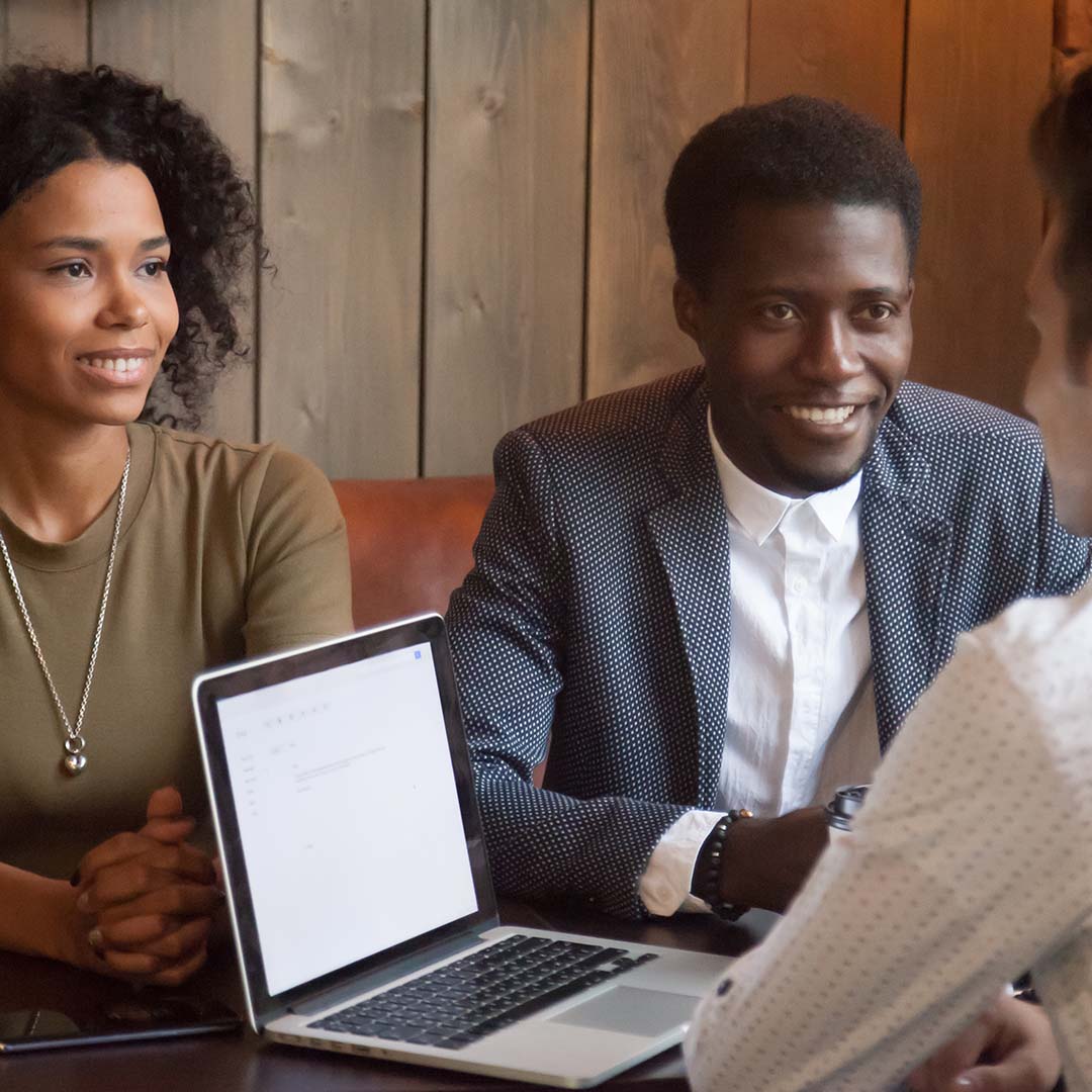 People discussing with a lender
