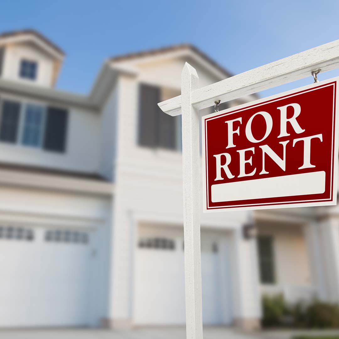 House with 'for rent' sign