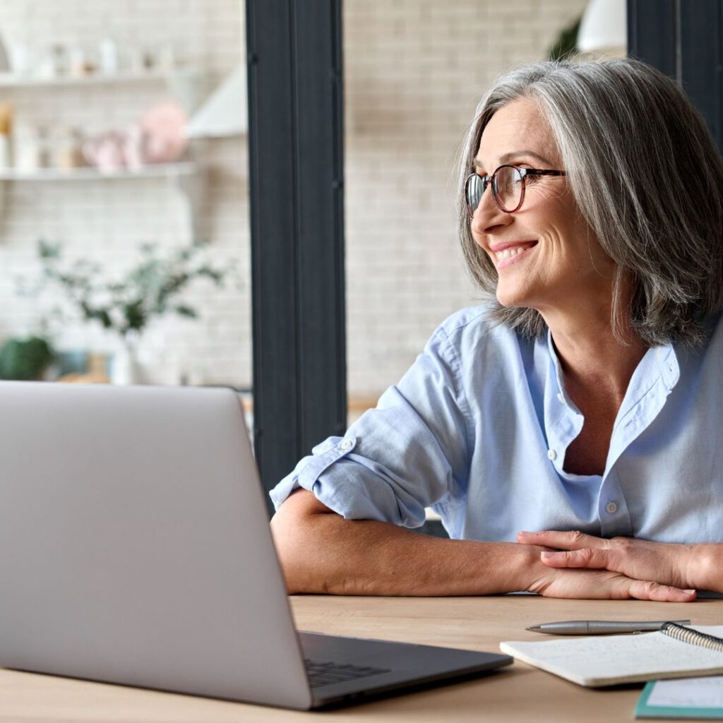 Happy person on their computer