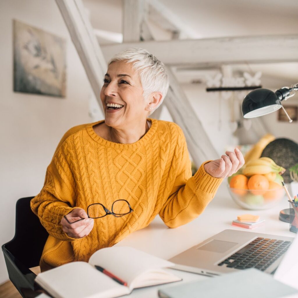 Happy person looking over paperwork