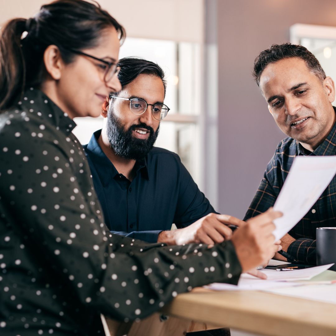 business people discussing paperwork