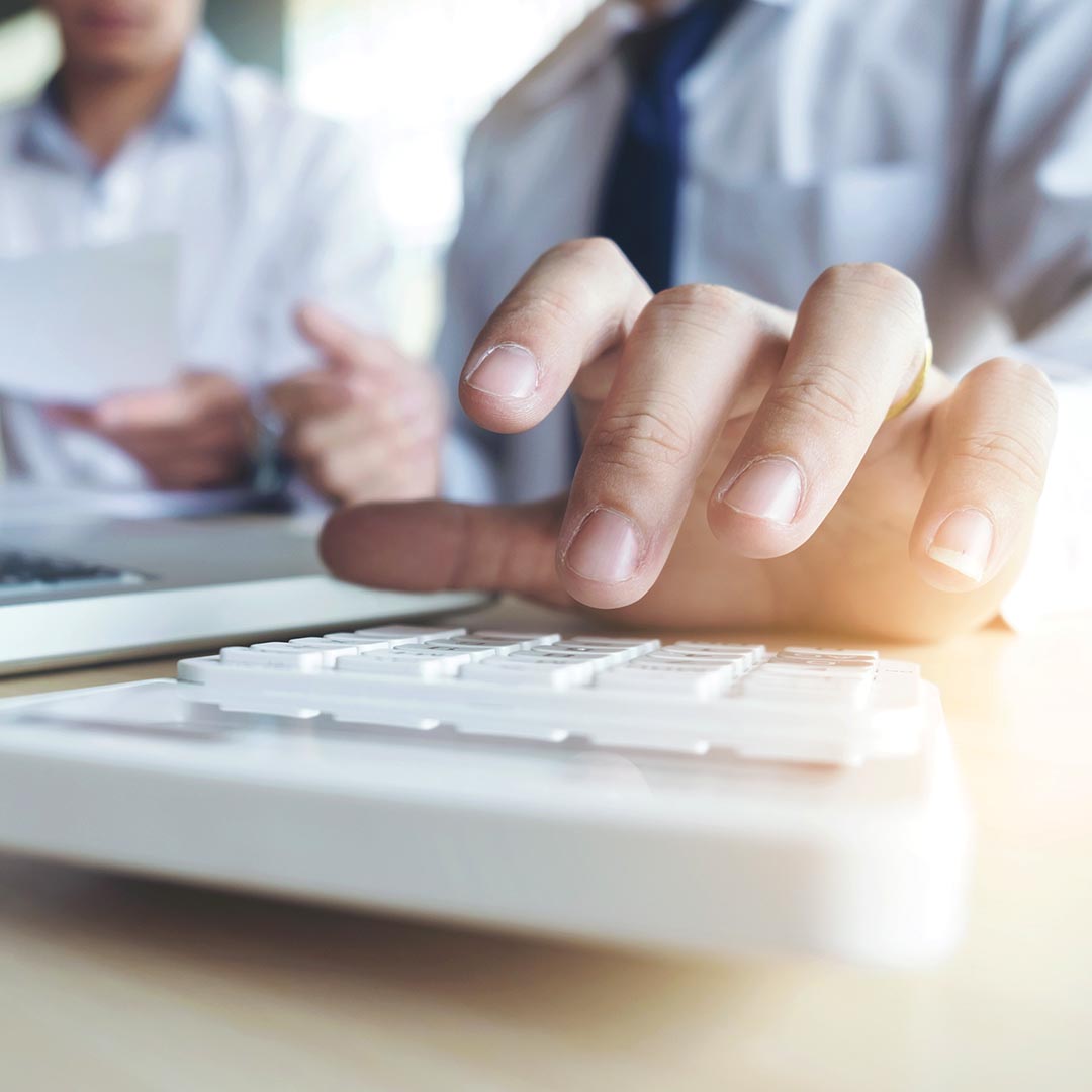 business man using a calculator