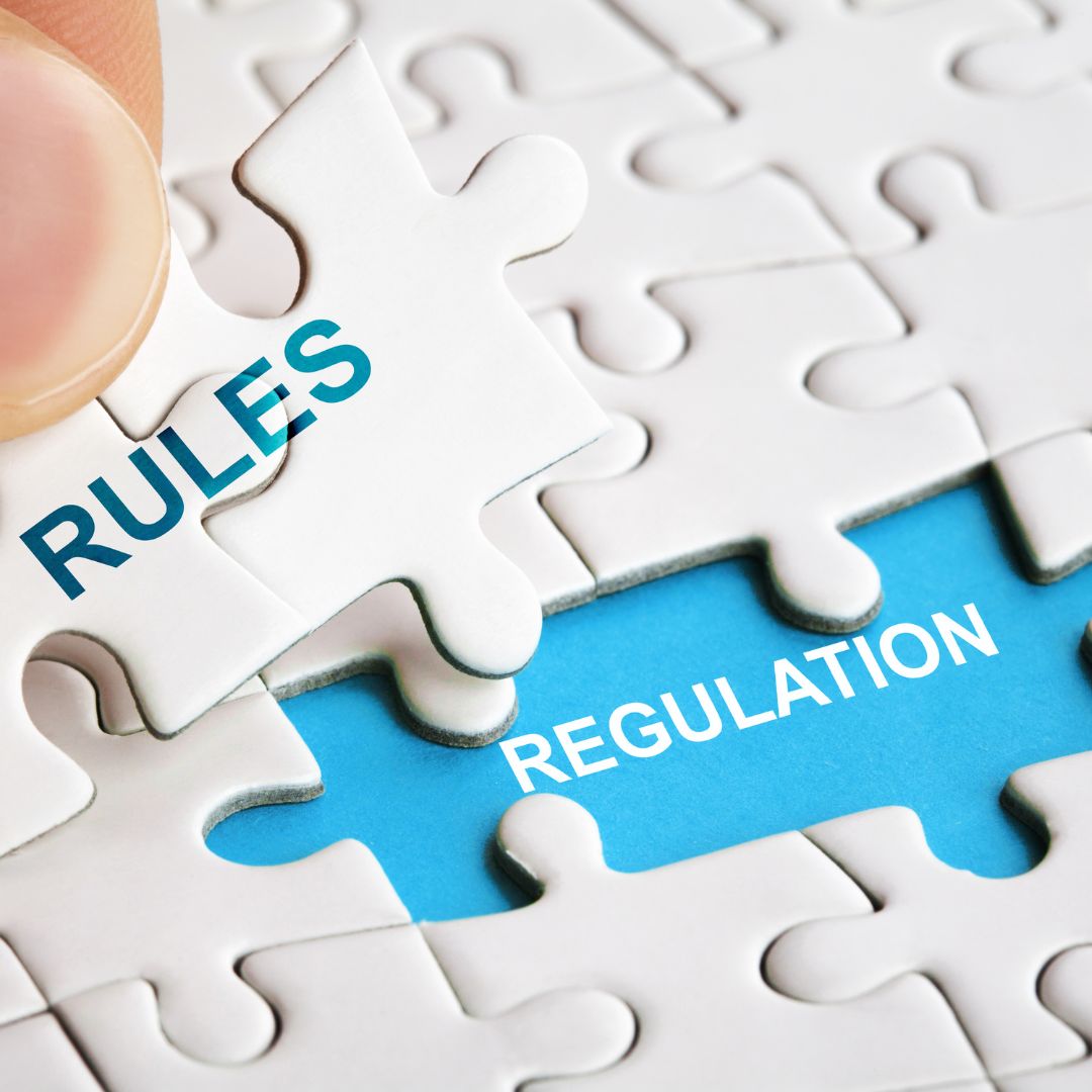 Puzzle pieces that say rules and regulations