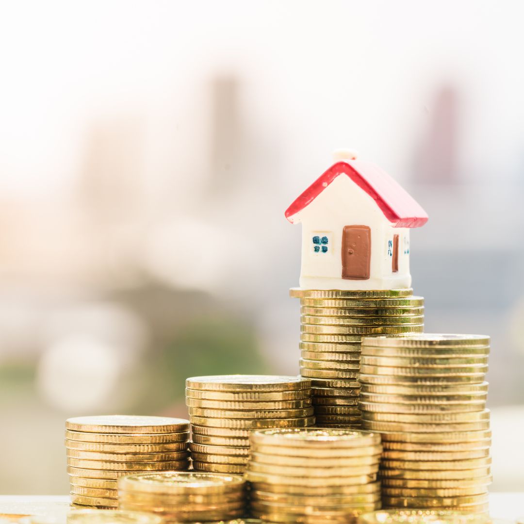 a house on top of coins
