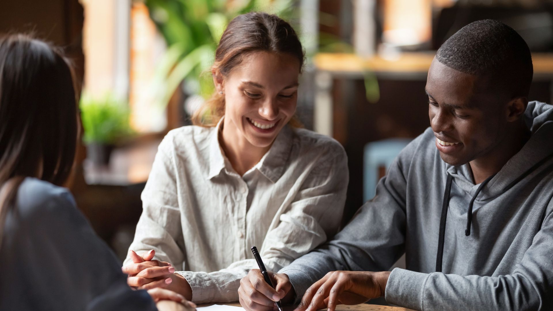 Couple talking with a lender
