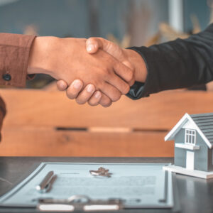 shaking hands with a financial lender