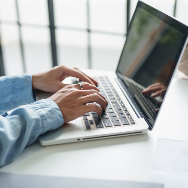 man evaluating financing options online