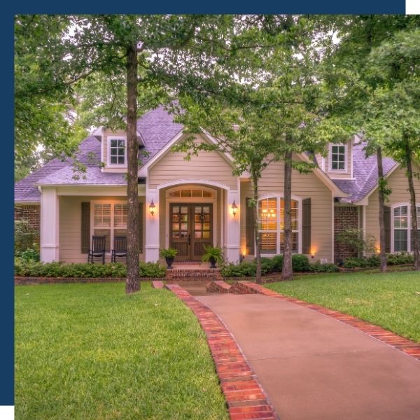 Nice home with large trees in front yard